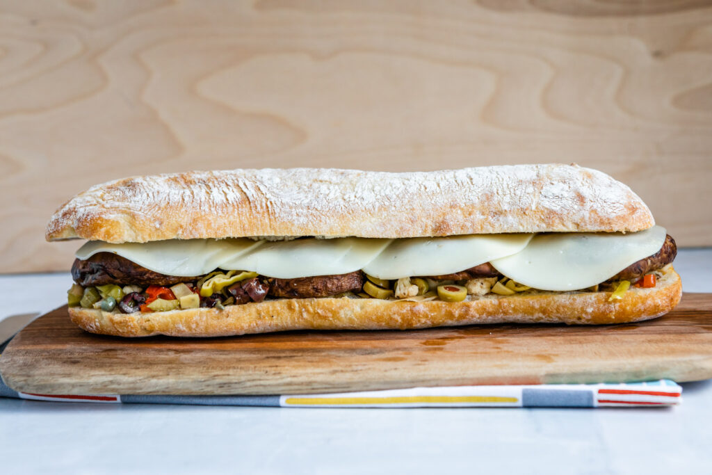 This Vegetarian Muffuletta Might Not Be Authentic, But It Tastes So Good You Won't Care