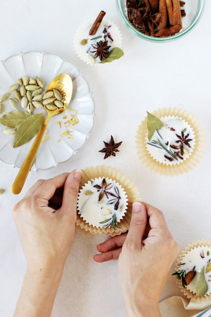 Candle wax melts formed with paper baking cups in a muffin tin