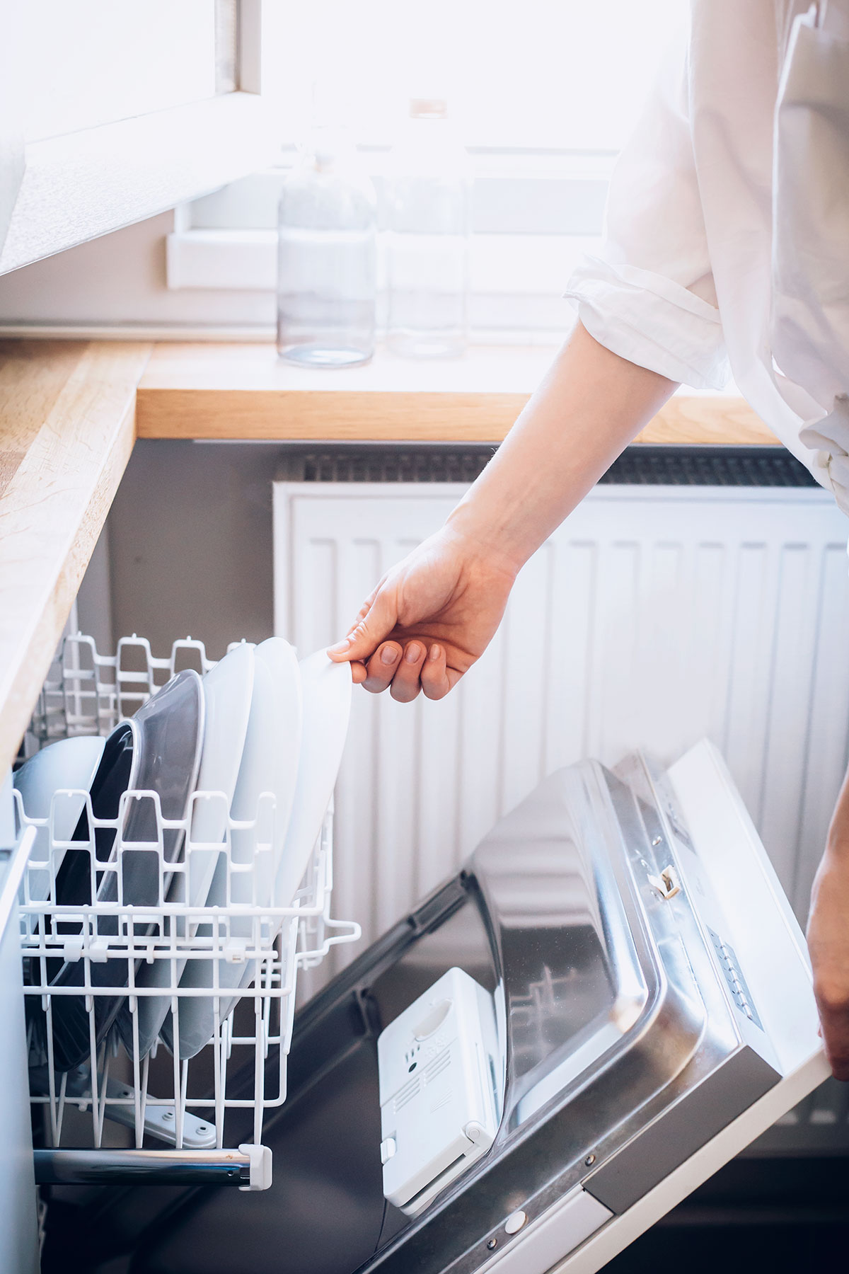 How To Clean Dishwasher With Vinegar + Baking Soda