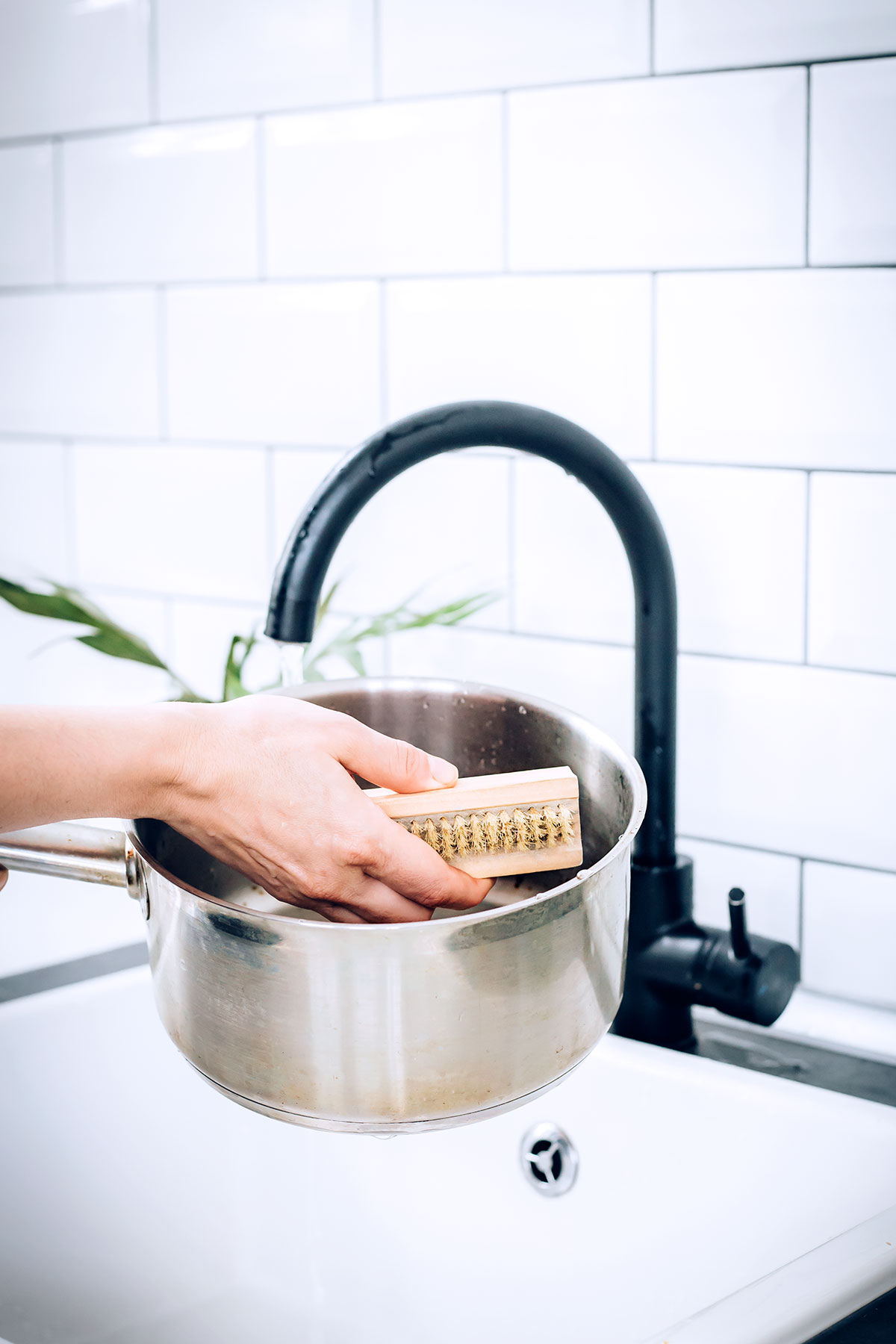 Scrubbing a burnt pot