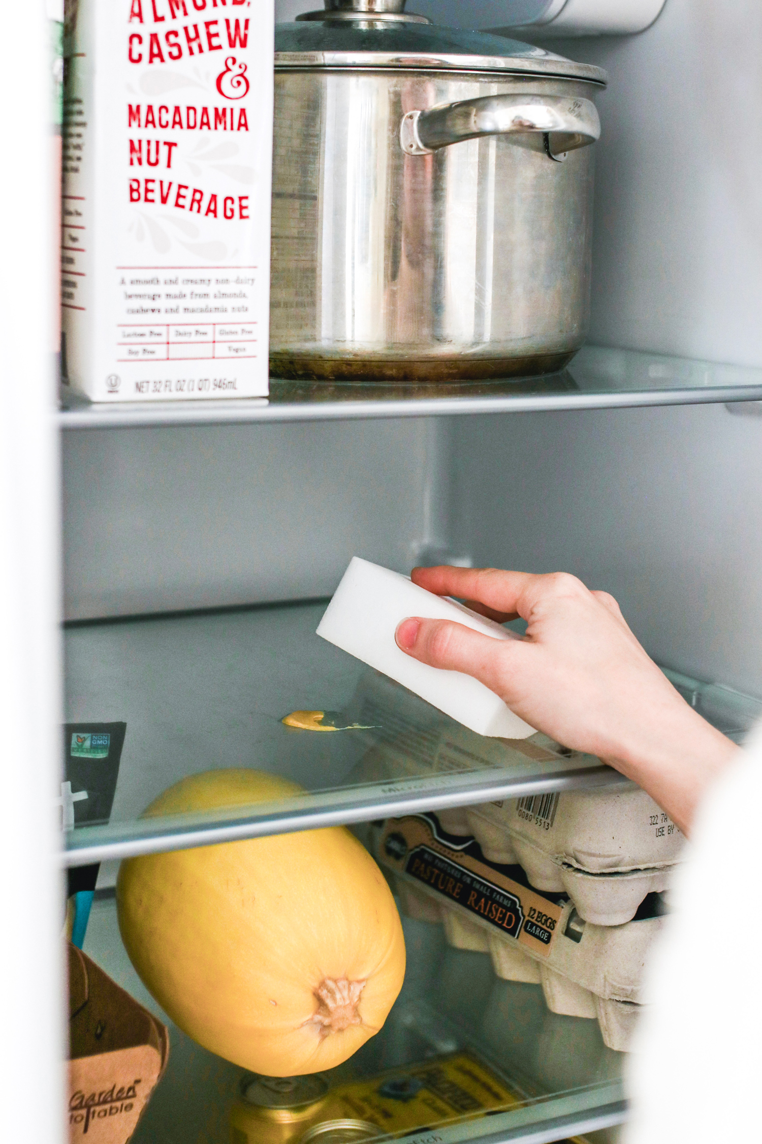 Mystery smell coming from the fridge? Learn how to deep clean your refrigerator, and get 2 easy recipes for disinfecting and deodorizing it.