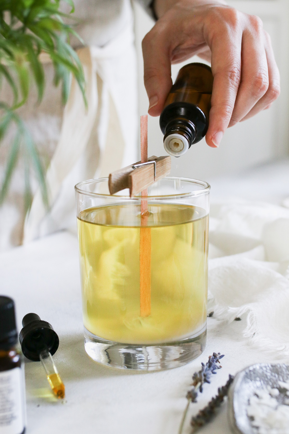 Here's everything you need to know to start making your own DIY essential oil candles. Learn which essential oils to use, how much to add and and when.