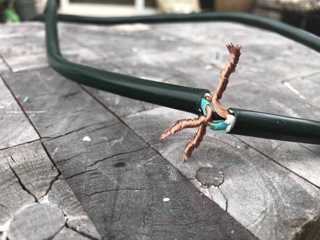 Twisting copper wires together to fix broken extension cord