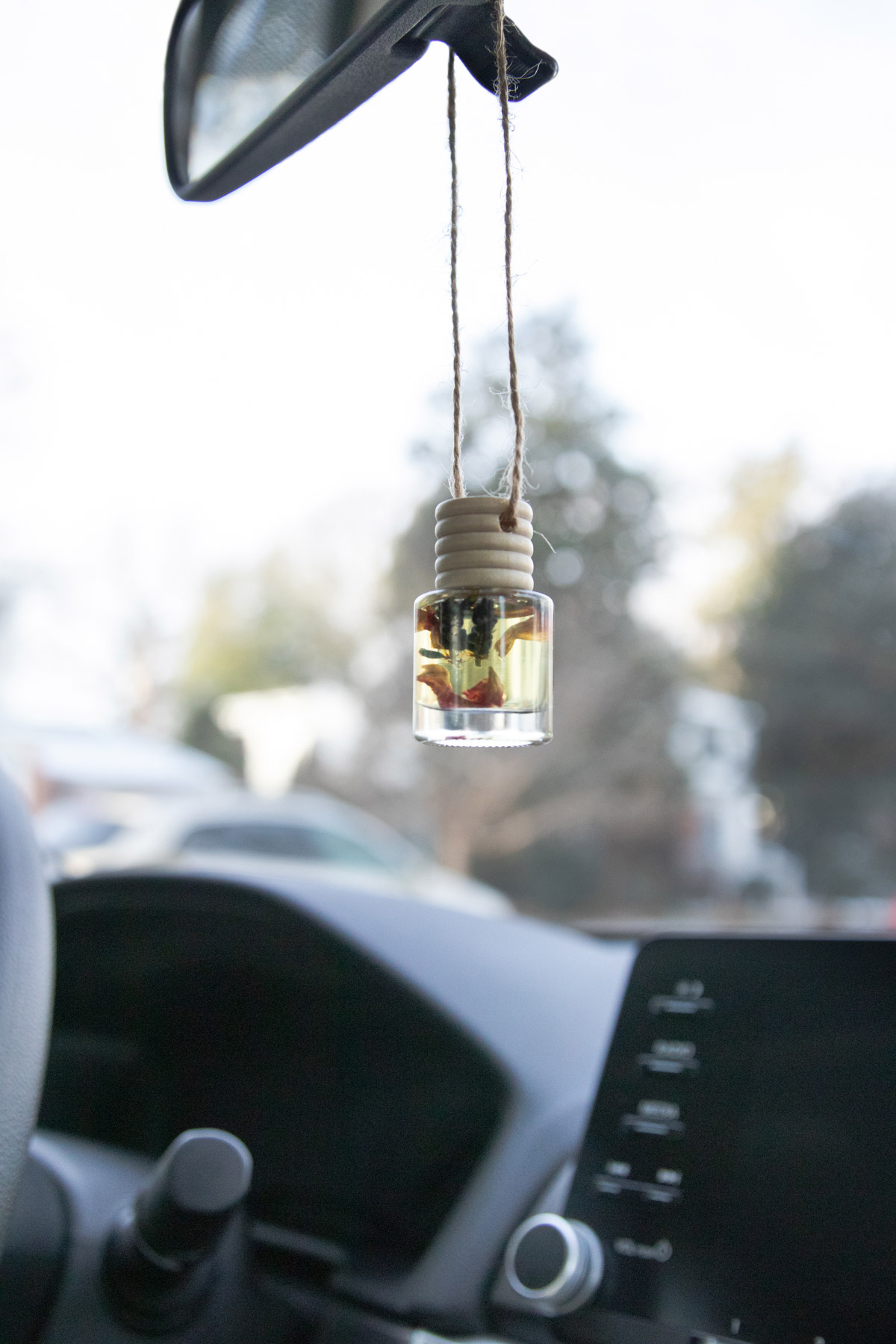 These DIY car air fresheners use herbs, botanicals and essential oils to give your car a fresh, sunny scent, naturally.