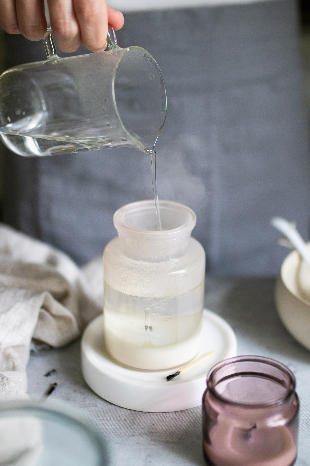 Here's how to get wax out of old candles and put that containers to good use